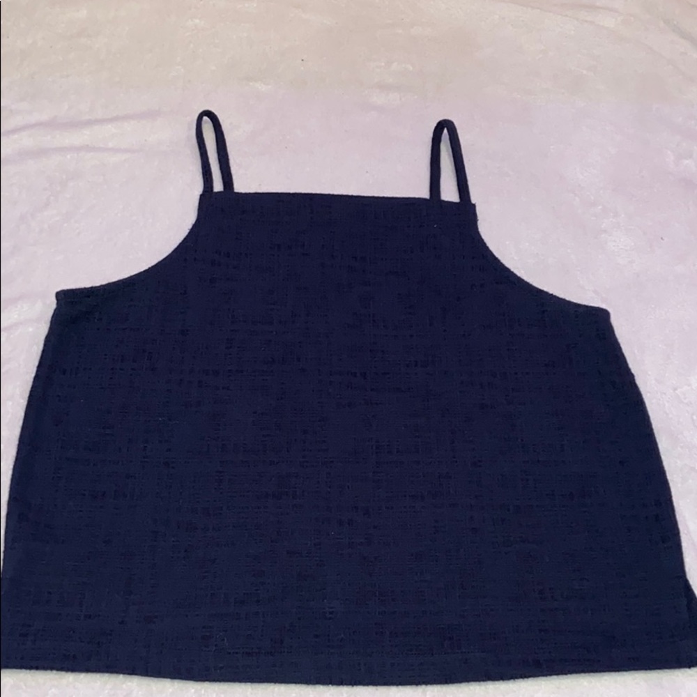 Navy shirt.